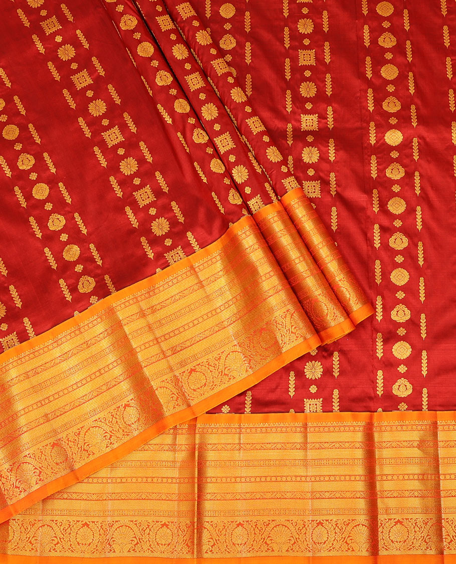 Red zari design pure-silk half-saree with contrast border of traditional zari designs, contrast zari bordered blouse, and a dhavani of manga designs