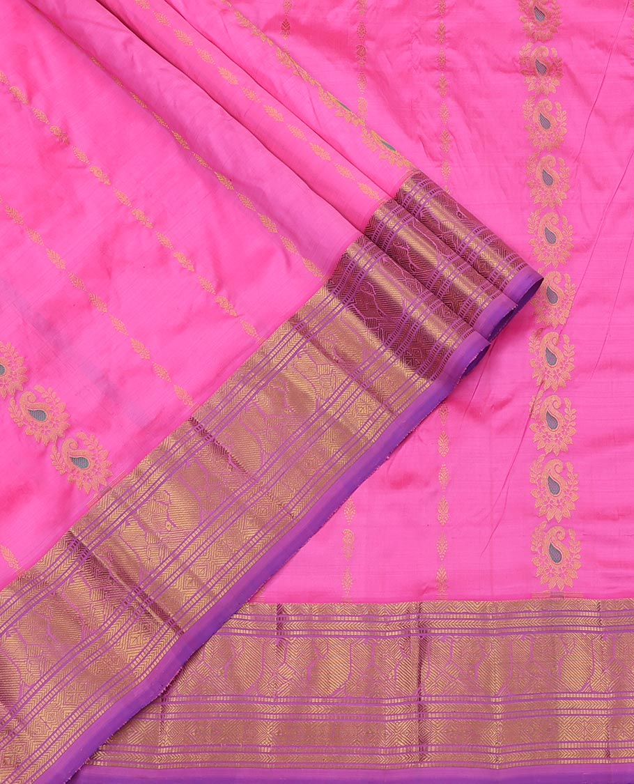 Pink Pure Silk Half-Saree, Spotlighted with Zari Designs on Its Body, Complemented by a Contrast Traditional Zari Design Border, Complemented by a Contrast Blouse, and Paired with a Contrast Dhavani of Ogee Designs