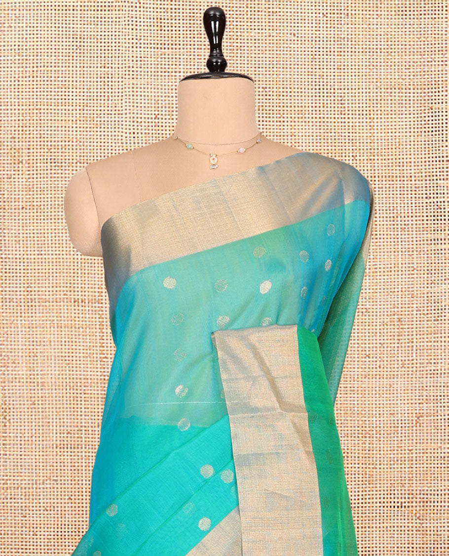 Sea Green Silk Cotton Saree, Adorned with Zari Buttas, Contrast Border, Gleaming Zari Pallu, and a Matching Blouse