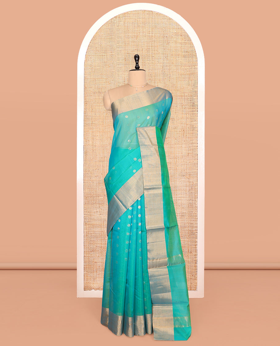 Sea Green Silk Cotton Saree, Adorned with Zari Buttas, Contrast Border, Gleaming Zari Pallu, and a Matching Blouse