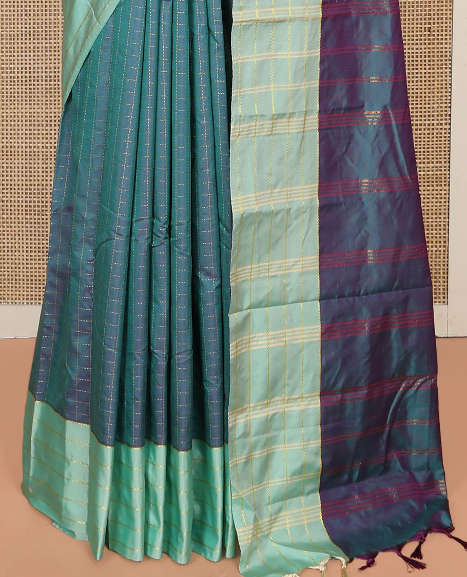 Blue Aarani Silk Saree, Dazzled with Butta Enclosed Checked Design on Its Body, Complemented by a Contrast Zari Striped Border, Pallu of Butta Enclosed Checks, and Paired with a Matching Blouse