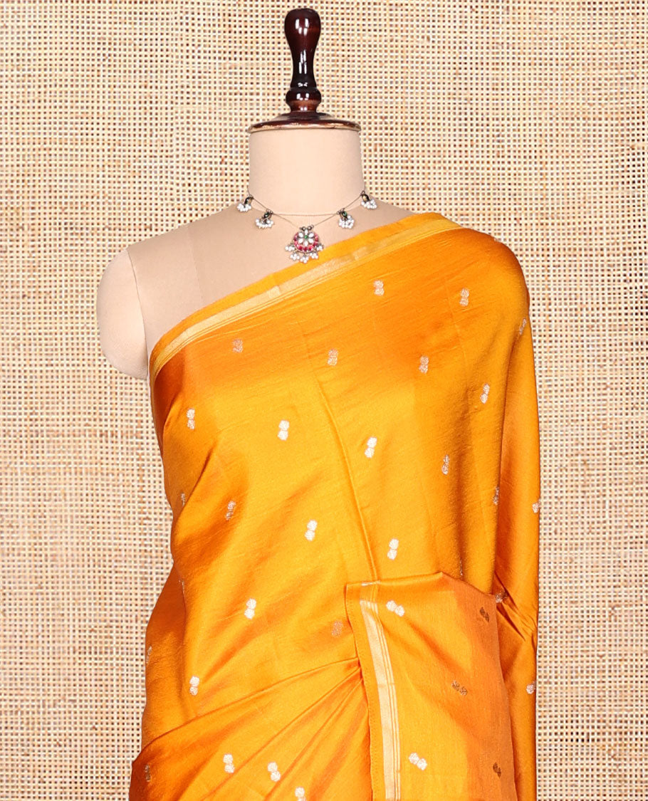 Orange Satin Silk Saree, Finely Crafted with Buttas, a Subtle Piping Border, Complemented by a Contrast Floral-Paisley Jaal Pallu, and a Contrast Blouse