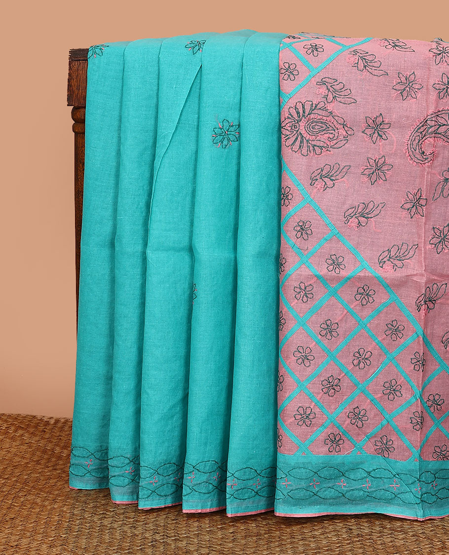 Blue flowers thread embroidered Lucknowi chikankari saree, ogee patterned border, and floral-paisley embroidered pallu