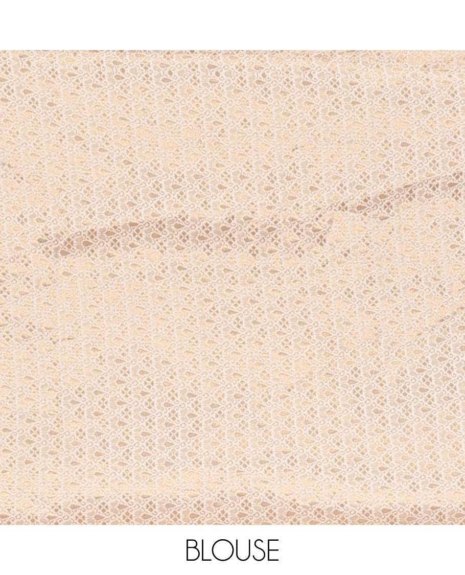 Cream plain design saree, zari border of floral designs, and Mughal-style pallu of zari floral designs