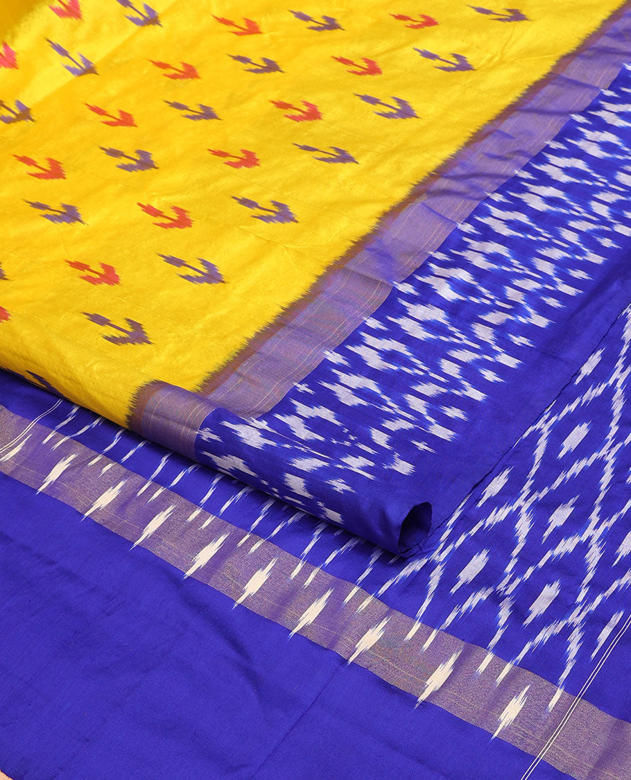 Yellow ikkat buttas ikkat saree, contrast ikkat floral border & pallu of ikkat argyle designs
