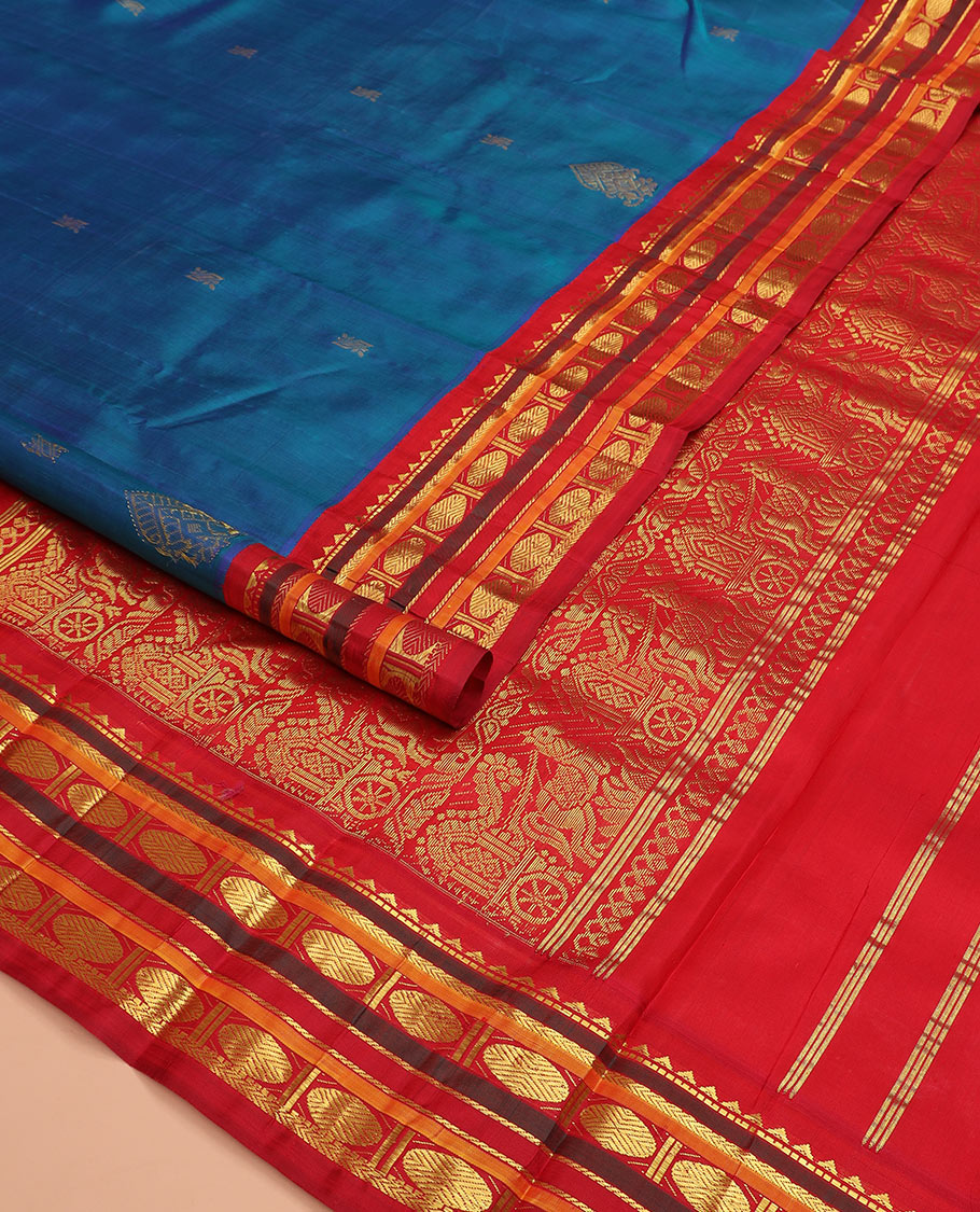 Blue zari buttas Kanchipuram silk saree, contrast border of rekku, muthu, kathir, rudraksham, and banaras designs, and horse chariot design woven pallu