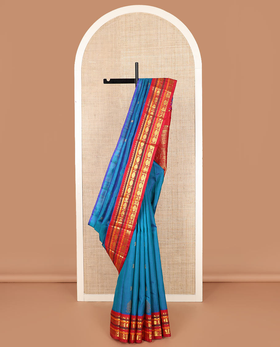 Blue zari buttas Kanchipuram silk saree, contrast border of rekku, muthu, kathir, rudraksham, and banaras designs, and horse chariot design woven pallu