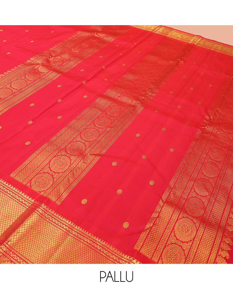 Red zari buttas Kanchipuram silk saree, zari border of muthu, neli, mayil, and mayil kann designs, and chakram design pallu