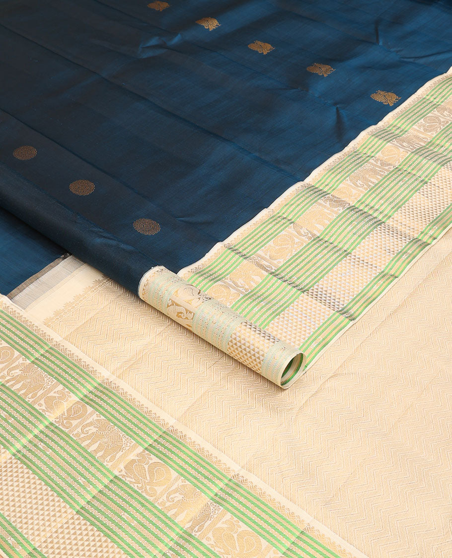 Blue mayil chakram buttas Kanchipuram silk saree, contrast border of banaras,lavangam, yaanai, mayil, and chevron design pallu
