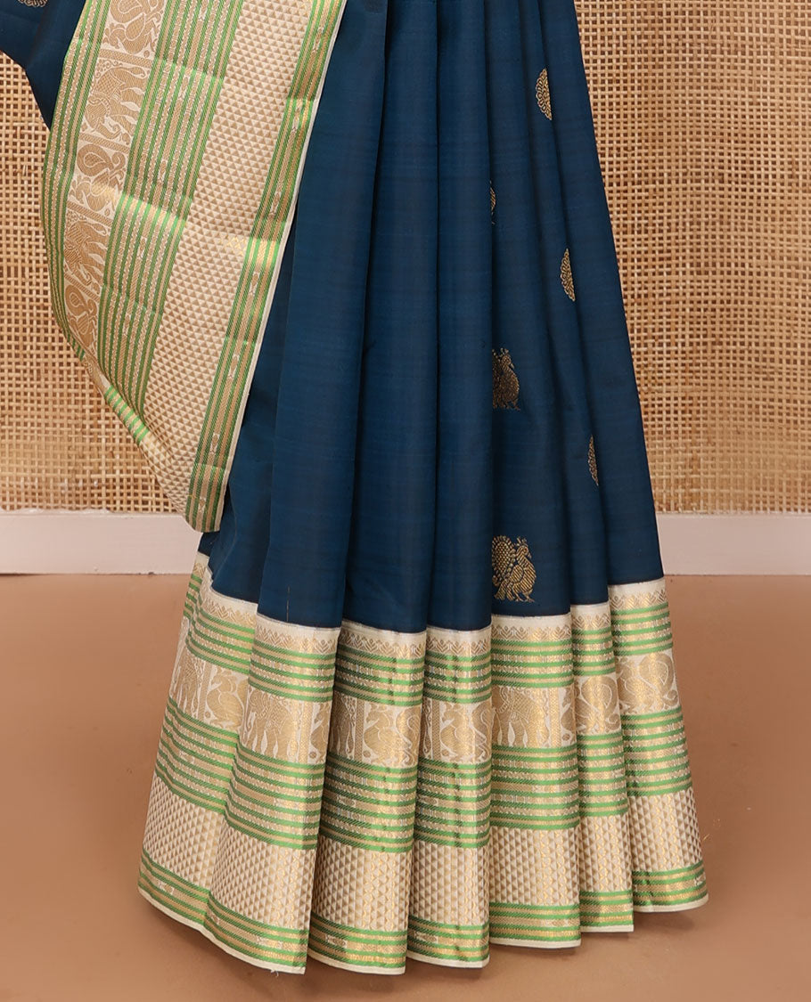 Blue mayil chakram buttas Kanchipuram silk saree, contrast border of banaras,lavangam, yaanai, mayil, and chevron design pallu