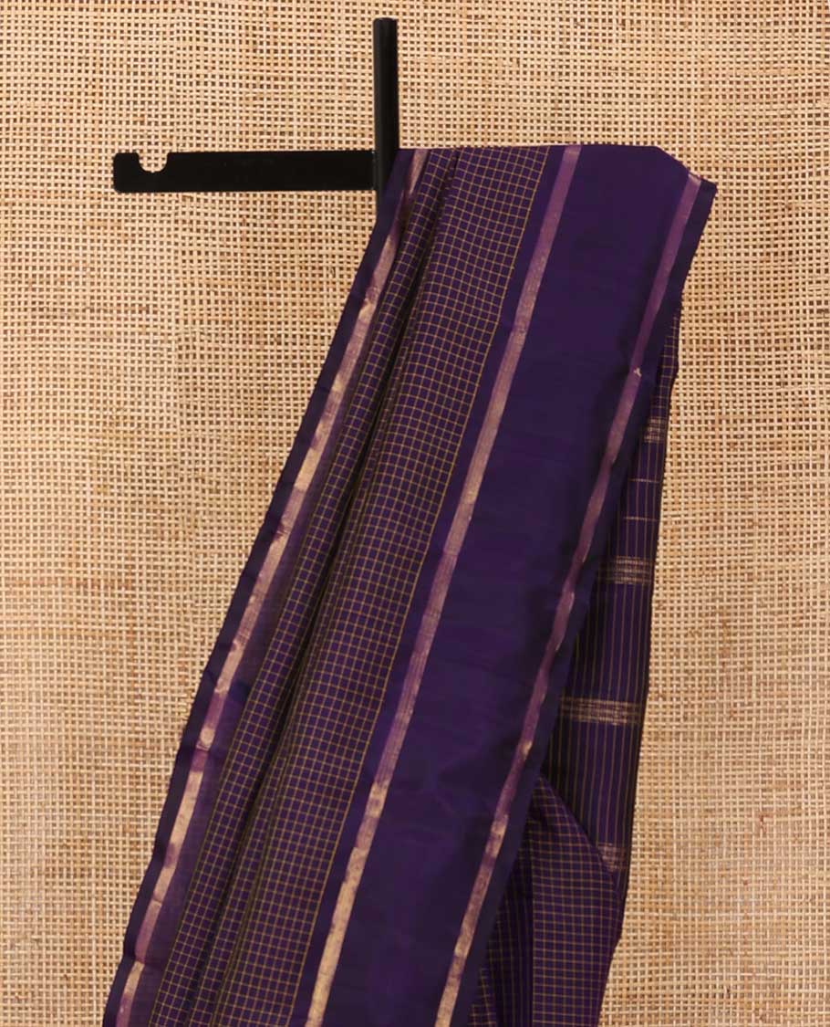 Blue zari micro-checked Kanchipuram silk saree, rettai pettu zari striped border, and zari design pallu