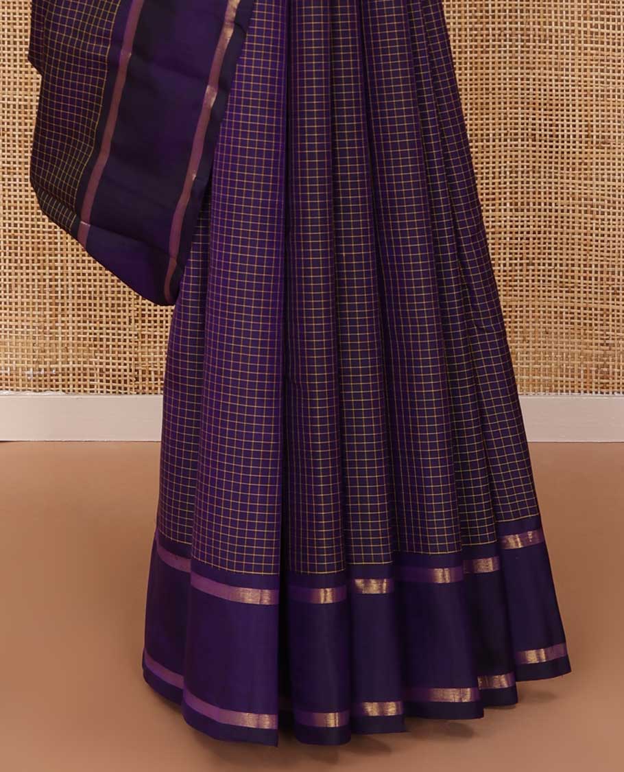 Blue zari micro-checked Kanchipuram silk saree, rettai pettu zari striped border, and zari design pallu