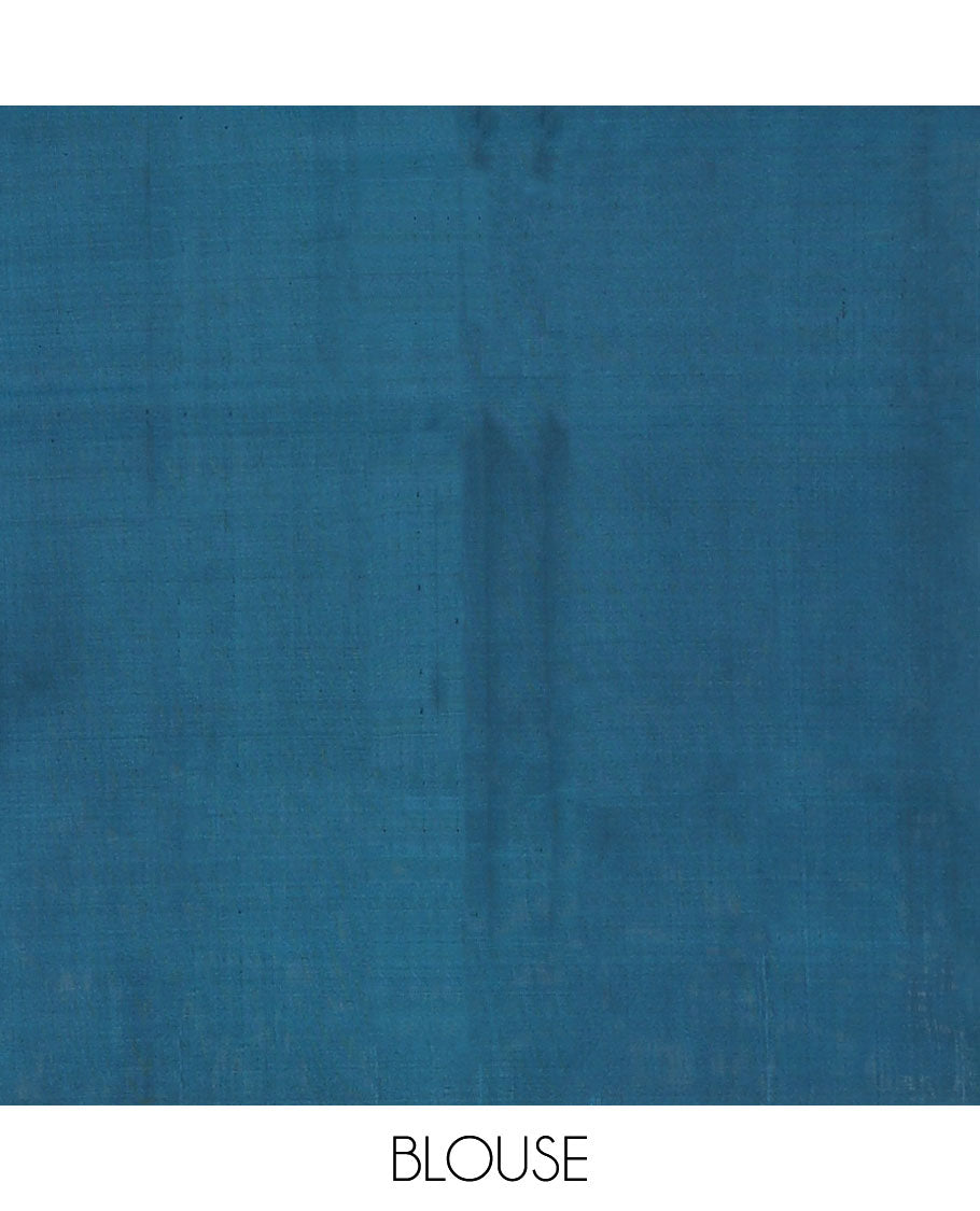 Borderless blue zari buttas soft silk saree, zari-rich pallu steeped with traditional zari designs