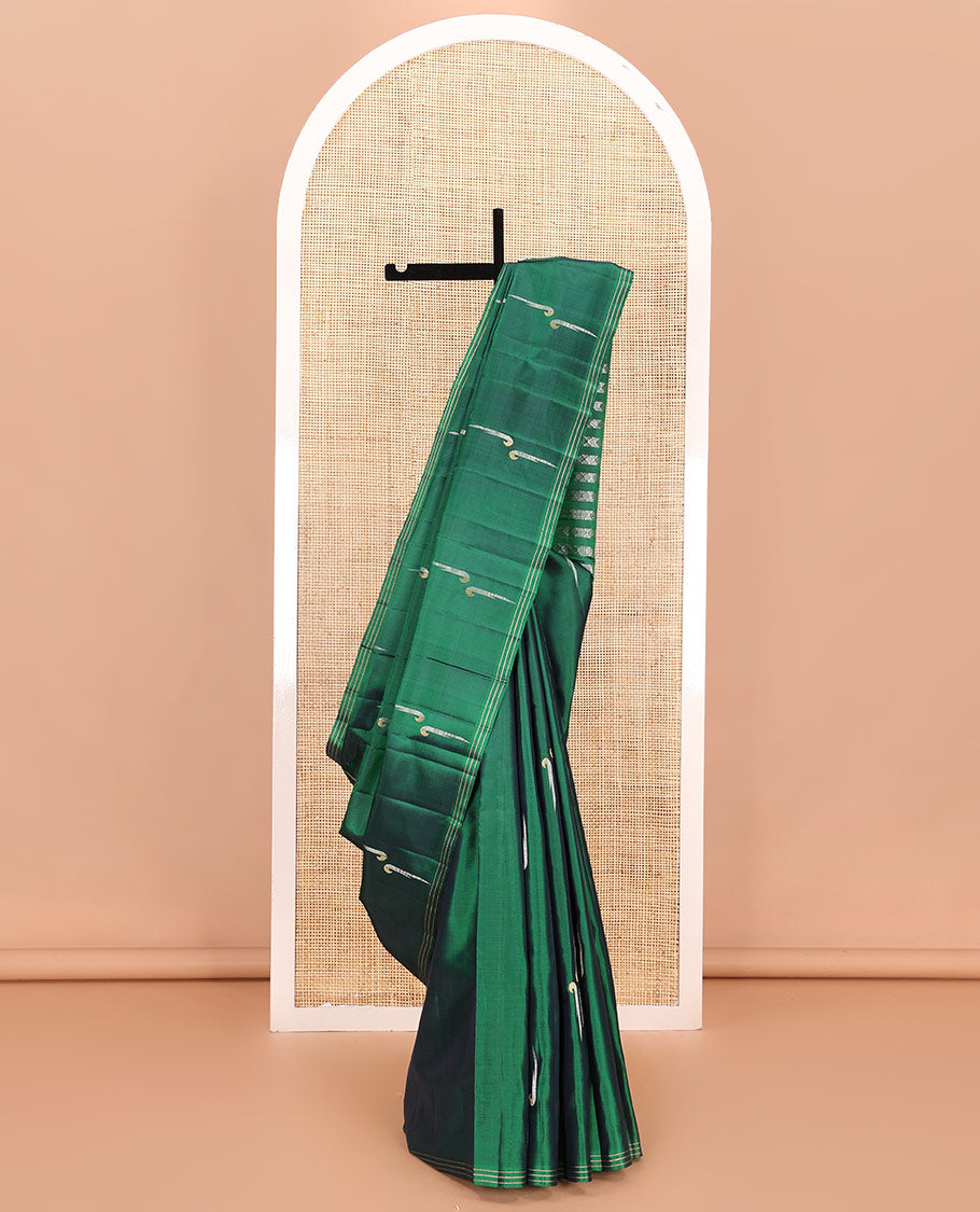 Green muniya buttas soft silk saree, zari striped border, and rudraksham motifs pallu