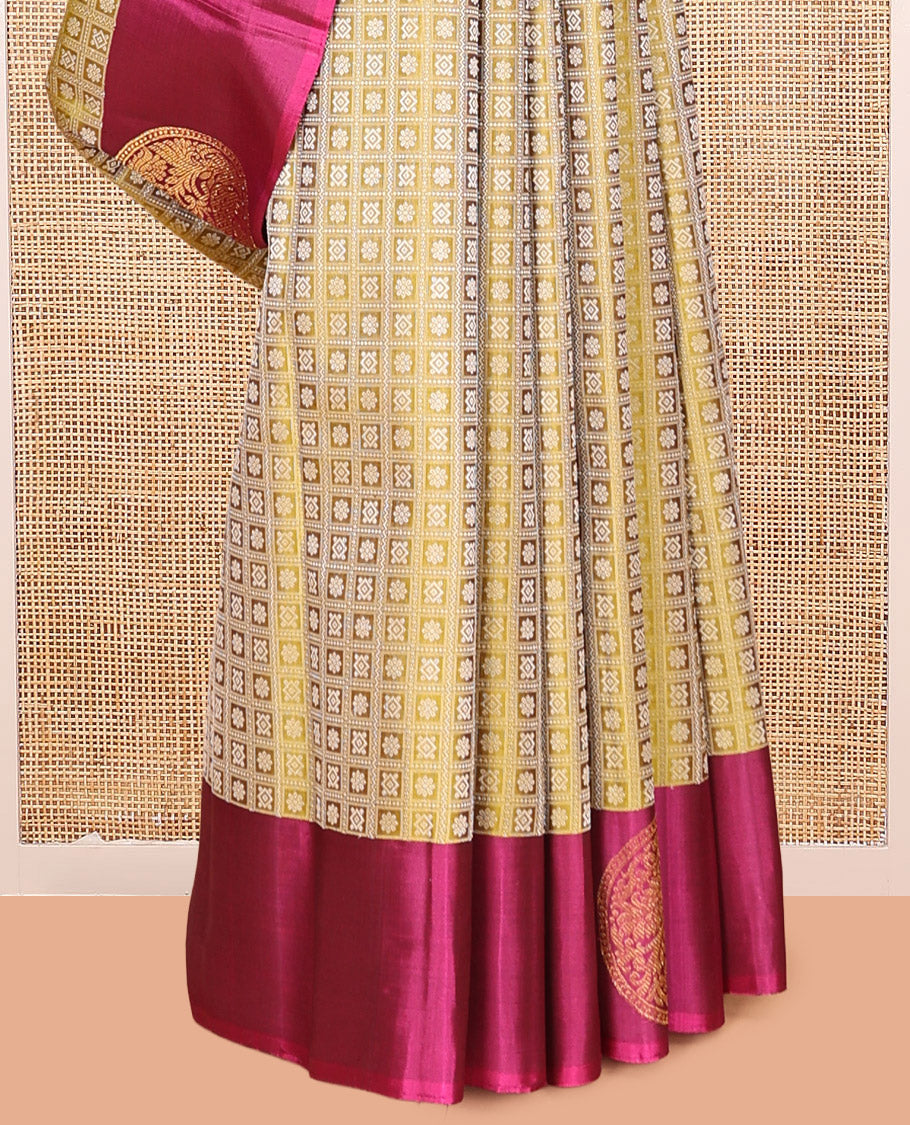 Green Embossed Parambara Silk Saree, a Contrast Border of Chakram Designs, Grand Pallu of Jaal Design, and Contrast Blouse