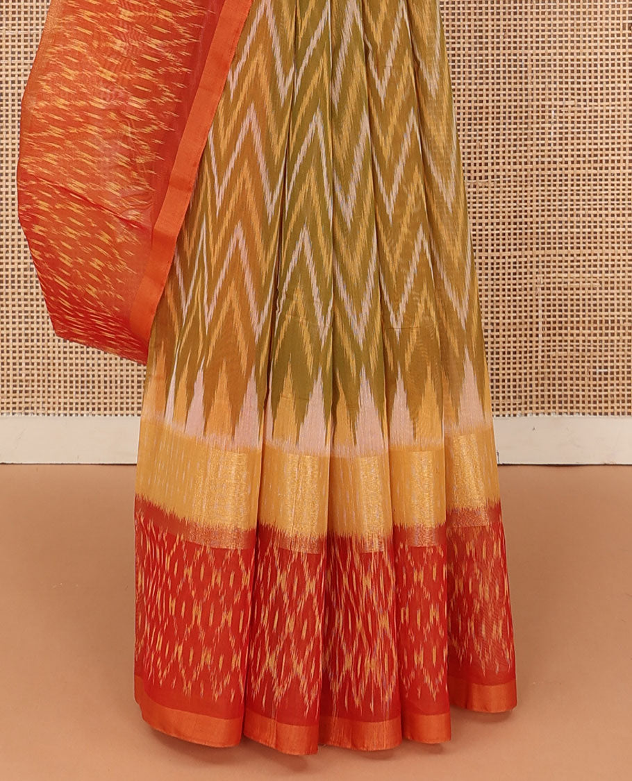 Green ikkat chevron design silk cotton saree, contrast zari bavanji border of ikkat jaal design, and pallu of jaal design