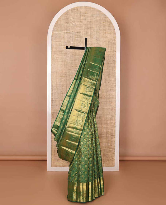 Green floral design silk saree with self border of thilakam mokku, banaras, kathir, kosi visiry design & zari design pallu