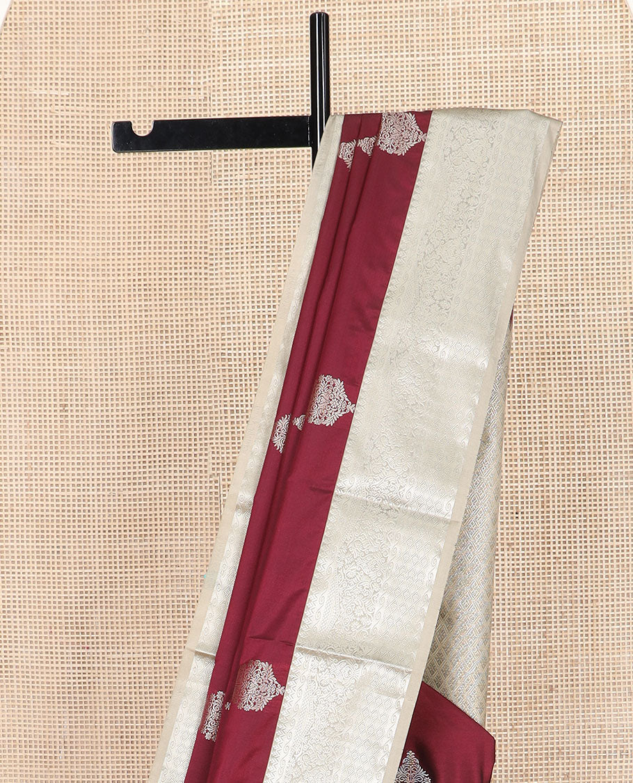 Maroon zari buttas soft silk saree, contrast traditional zari design border, and pallu of jaal design