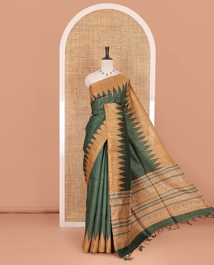 Green plain tussar silk saree, contrast temple border, and ikkat design pallu