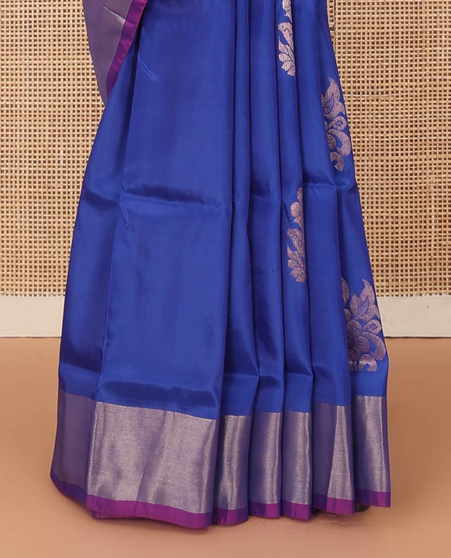 Royal blue zari buttas Uppada saree, contrast bavanji border, and jaal design pallu