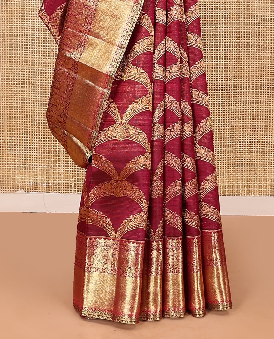 Maroon jacquard kanchipuram silk saree, zari border of thilakam, kodi visiry, and mayil designs, and jaal pallu