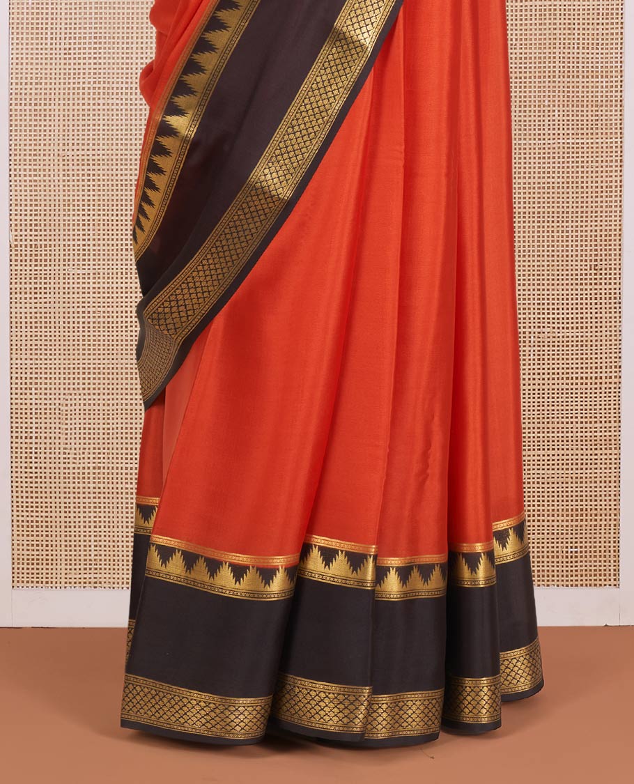 Rust Orange Plain Mysore Silk Saree, Gracefully Embellished with a Contrast Temple Border of Jaal Designs, Pallu Steeped with Zari Stripes, and Paired with a Contrast Blouse