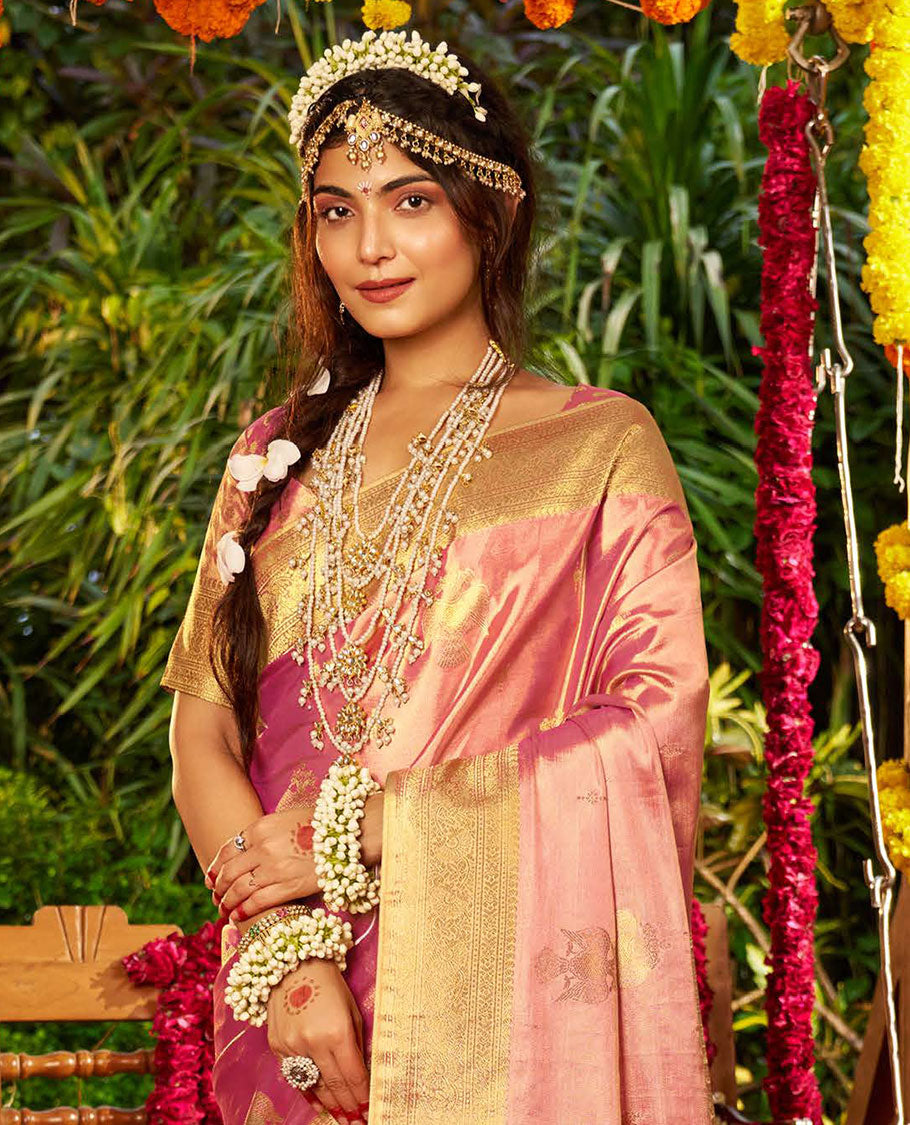 Pink Designer Catalog Saree, Prettified with Two-Headed Bird Buttas All Over Its Body, Highlighted by Traditional Zari Design Border, Pallu Depicts Intricate Designs, and Paired with a Matching Blouse