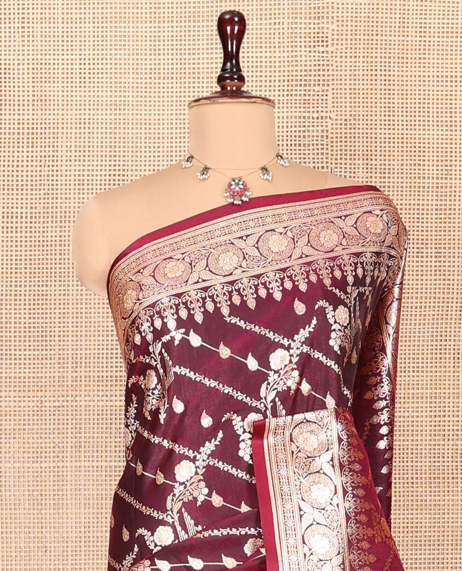 Wine Banarasi Nylon Saree, Prettified with Zari Designs, Highlighted by a Floral Creeper Zari Border, Intricate Pallu, and a Matching Blouse