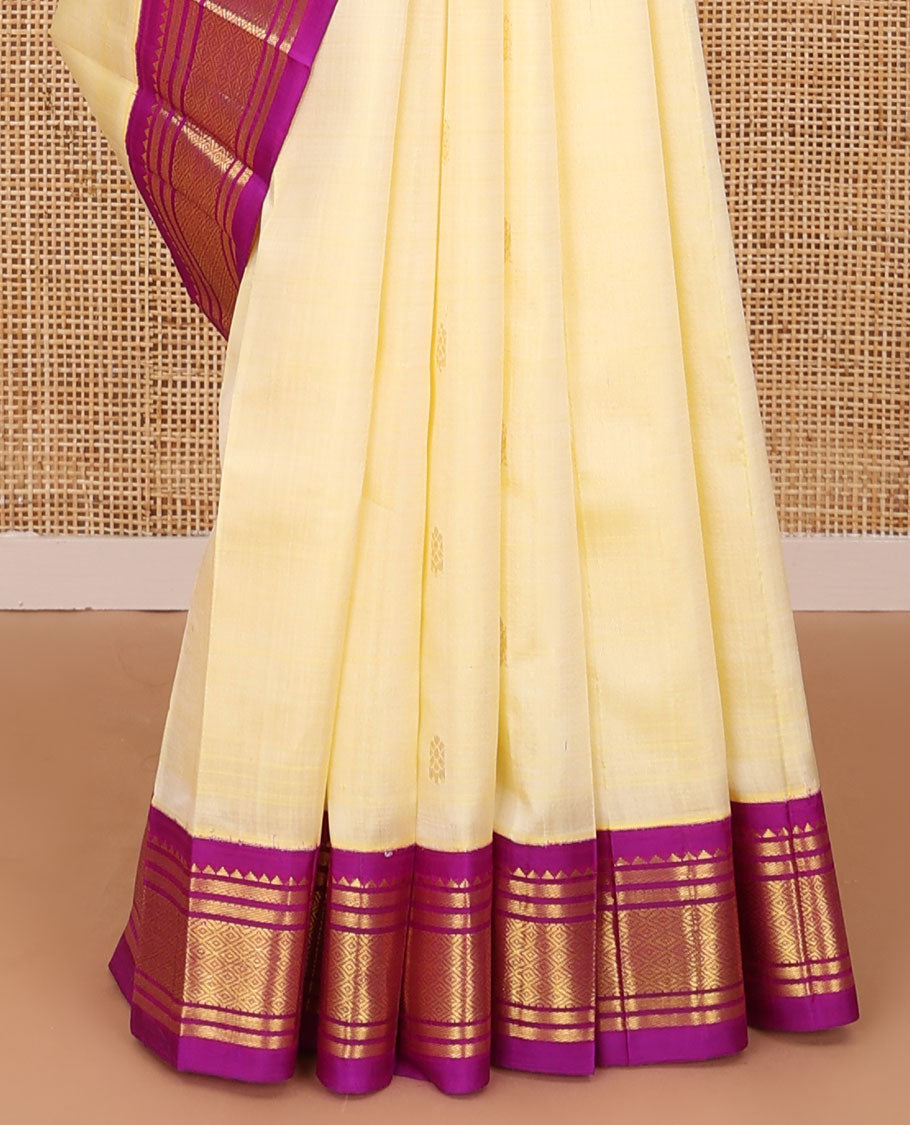 Yellow zari buttas Kanchipuram silk saree, contrast korvai one-sided border of rekku,banaras & jaal & zari design pallu