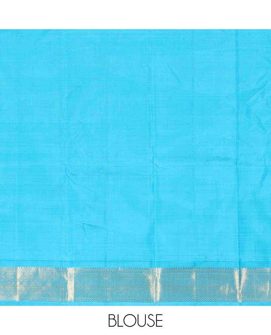 Yellow zari buttas Kanchipuram silk saree, contrast korvai border of thilakam mokku, muthu, and vanki designs, and zari-rich jaal pallu