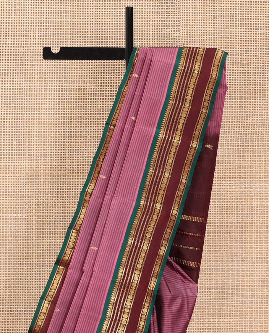 Rosewood Pink Kanchipuram Silk Saree Adorned with Vazhaipoo Stripes and Zari Buttas, Complemented by a Contrast Rettai Pettu Border Featuring Thazampoo Rekku, Muthu, Neli, and Rudraksham Designs, Gleaming Zari Pallu, and Paired with a Contrast Blouse