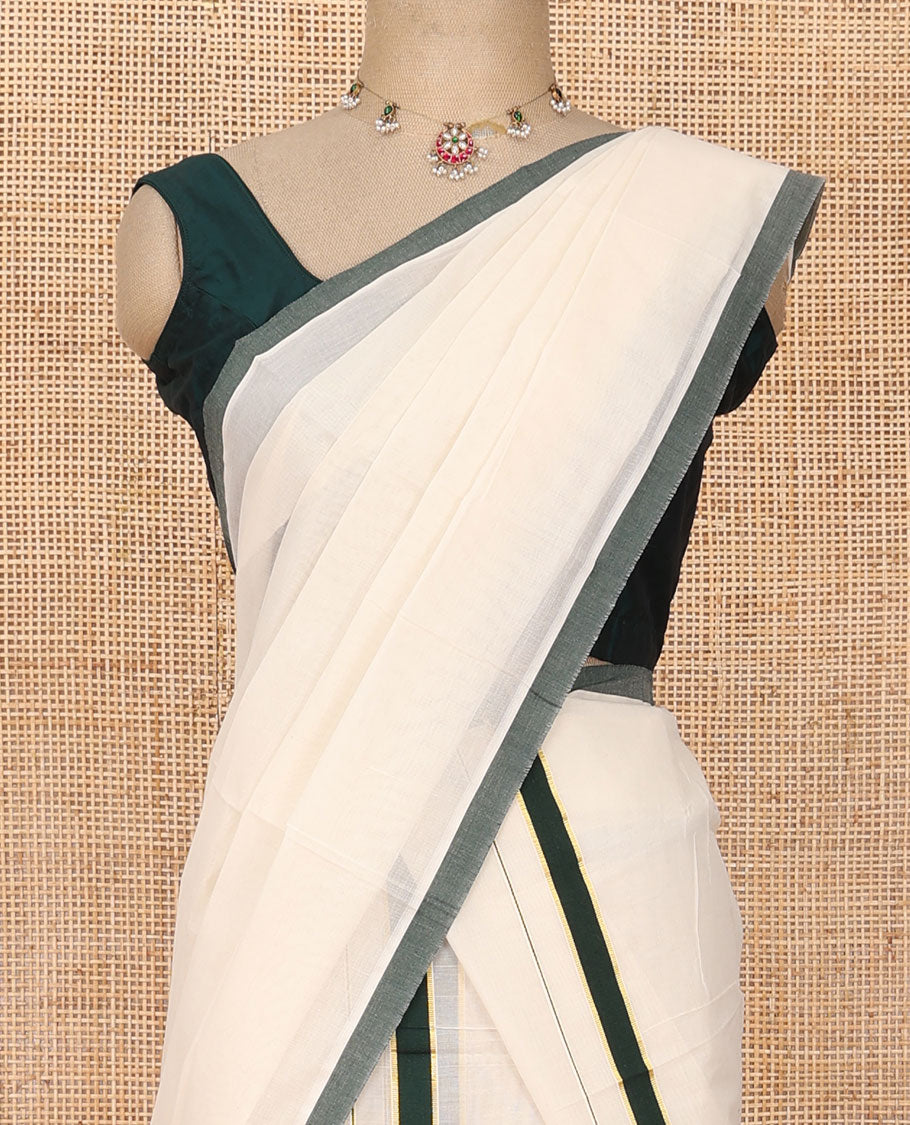 Cream plain Kerala mundu set with contrast deep forest green border