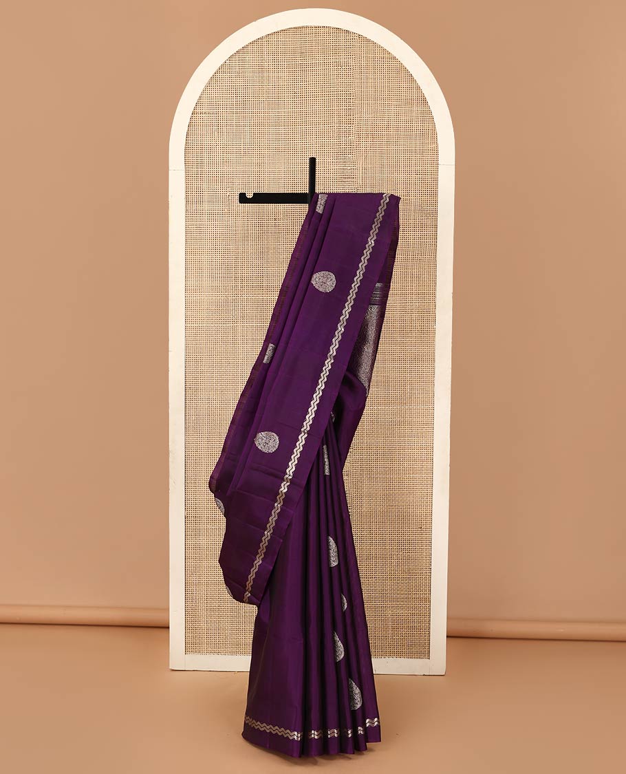 Purple thilakam zari buttas woven soft silk saree, zig-zag stripes border, and floral jaal pallu