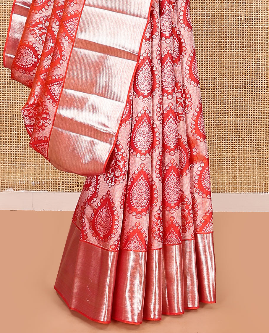 Orange jacquard kanchipuram silk saree, zari border, and zari woven pallu of intricate designs