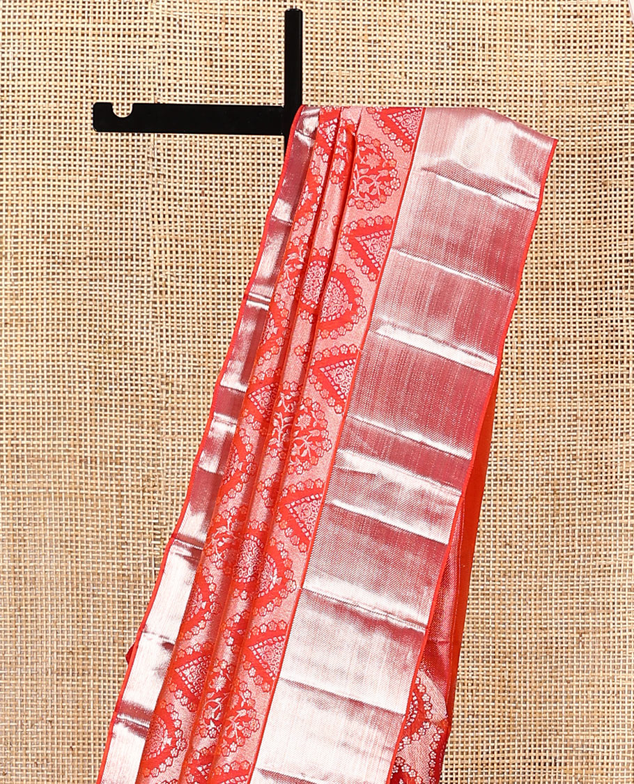 Orange jacquard kanchipuram silk saree, zari border, and zari woven pallu of intricate designs
