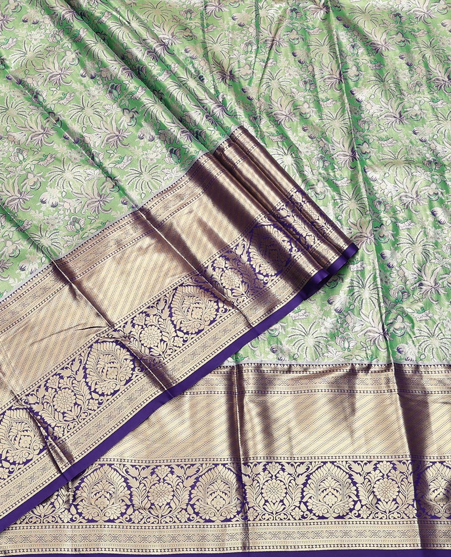 Green Art Silk Half-Saree, Spotlighted with Jacquard Design, Contrast Traditional Zari Border, Paired with a Contrast Jacquard Blouse, and an Intricate Dhavani