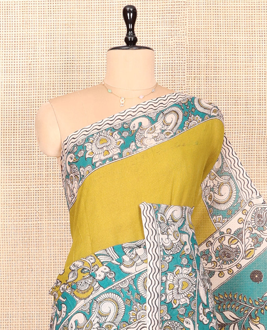 Green Kalamkari Cotton Saree, Elevated with Flora-Fauna Print, Contrast Kalamkari Printed Border, Peacock Kalamkari Pallu, and a Contrast Blouse