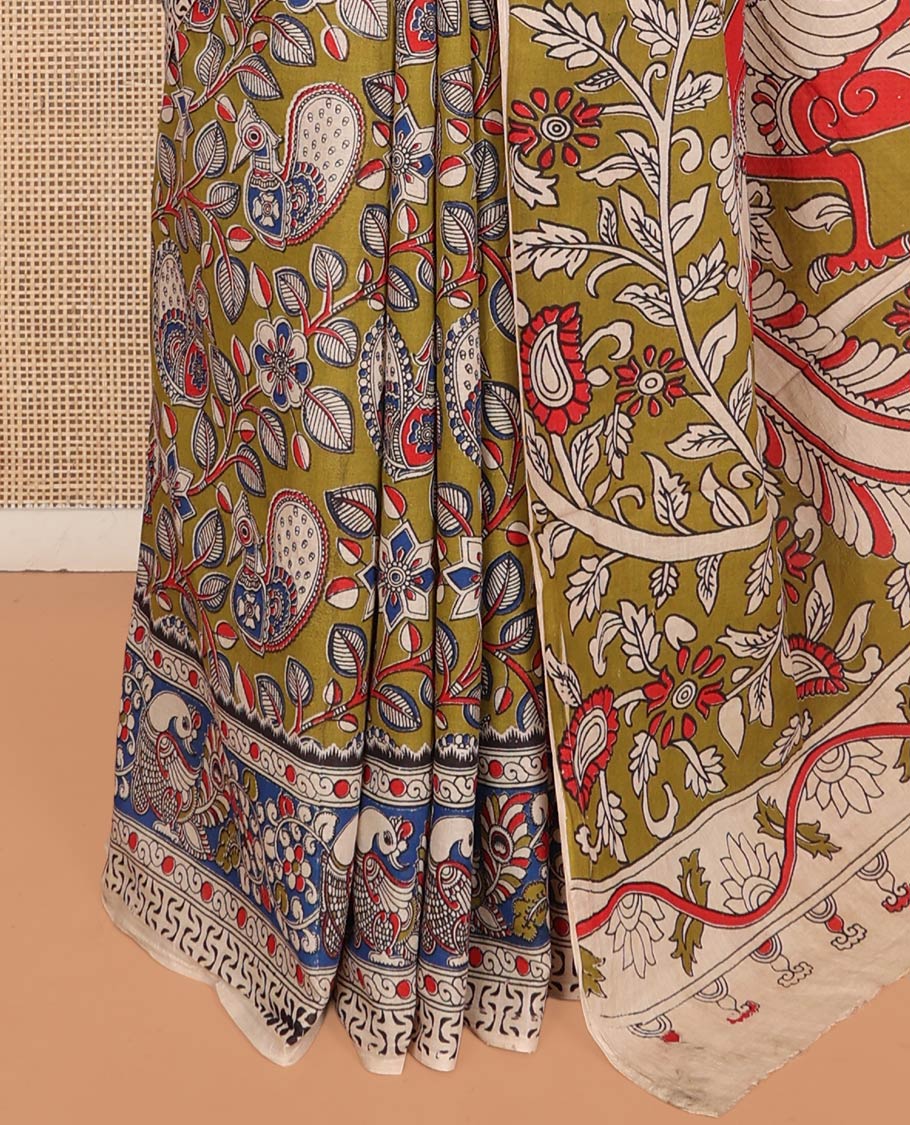 Green Machine-Printed Kalamkari Cotton Saree Features Flora-Fauna Design, a Contrast Peacock Border, Peacock Printed Pallu, and a Contrast Blouse