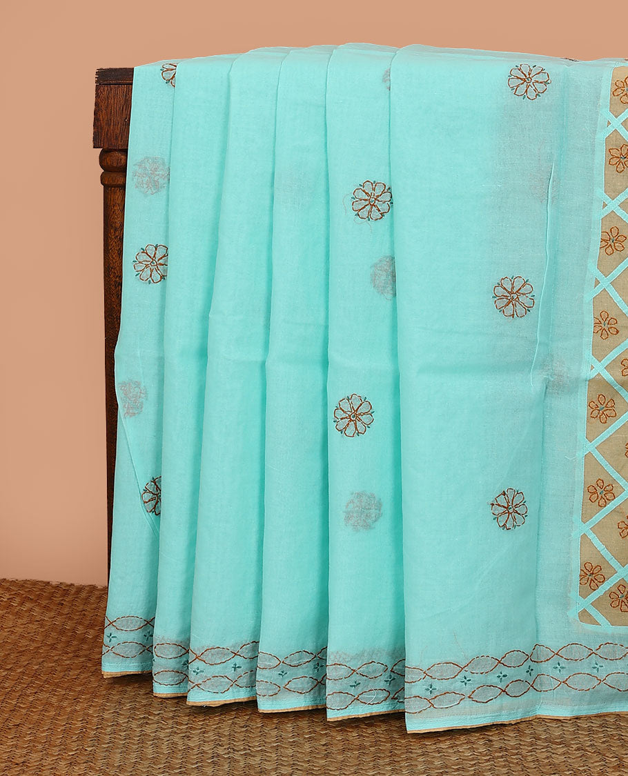 Turquoise flowers thread embroidered Lucknowi chikankari saree, ogee patterned border, and floral-paisley embroidered pallu