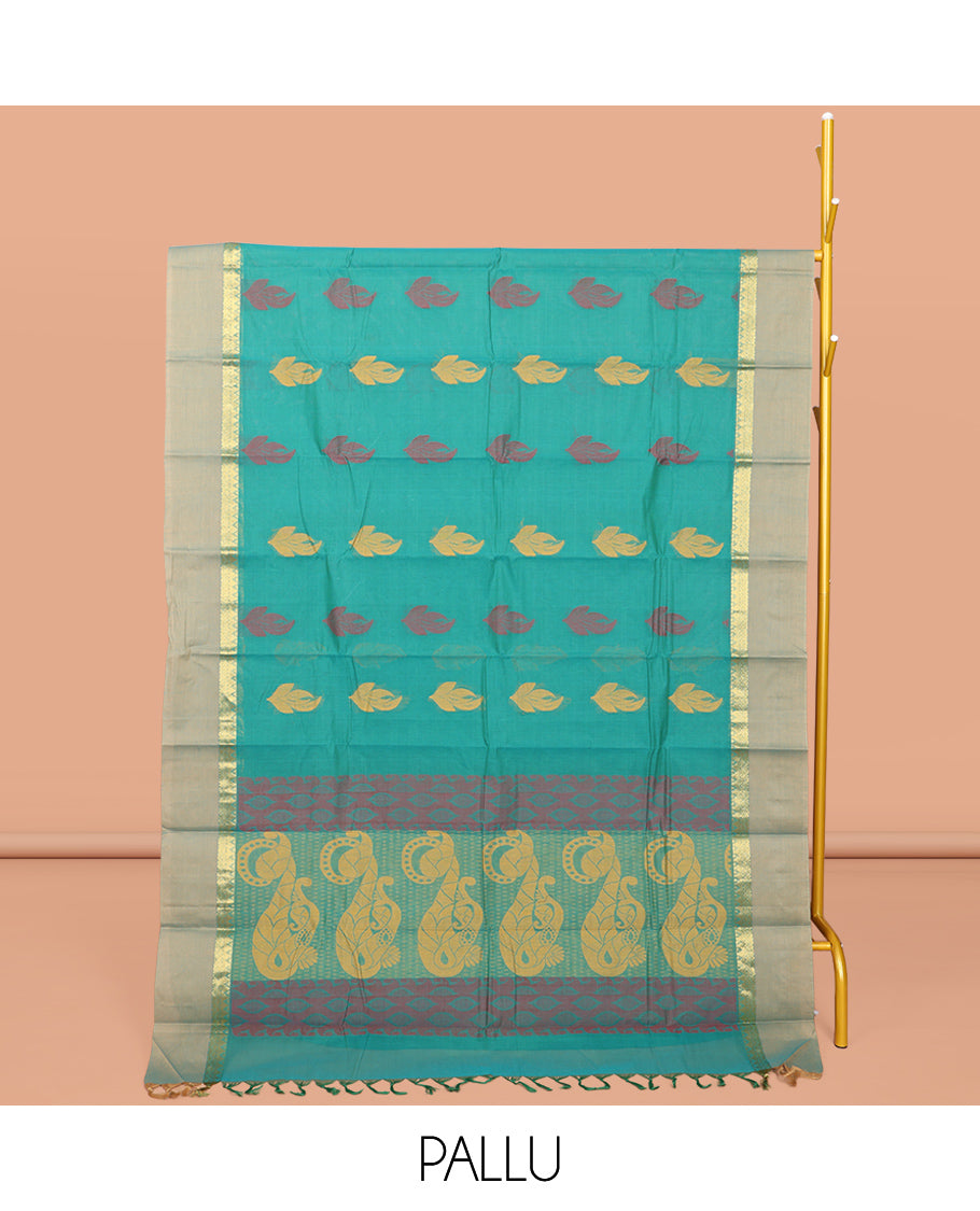 Green Kanchi Cotton Saree, Elevated with Buttas All Over Its Body, Complemented by a Contrast Border, Pallu of Intricate Design, and Paired with a Matching Blouse