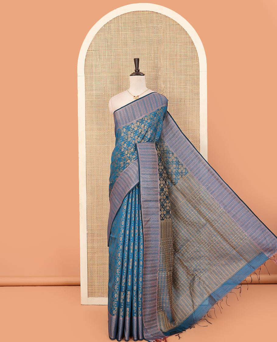 Blue floral jacquard art dupion saree, zari border, and pallu steeped with geometric patterns