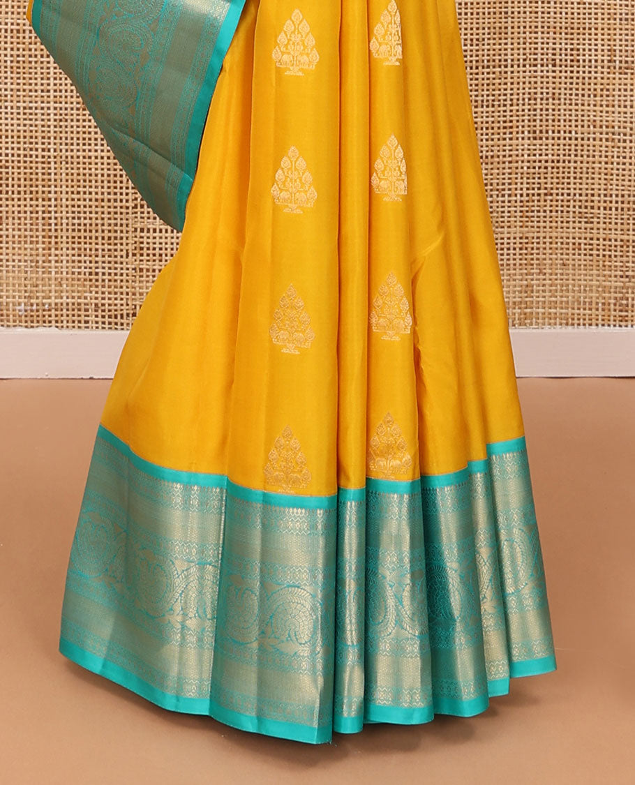 Yellow zari buttas silk saree, contrast border of salangai,neli,lavangam,mayil kann & dhavana kodi & jaal pallu