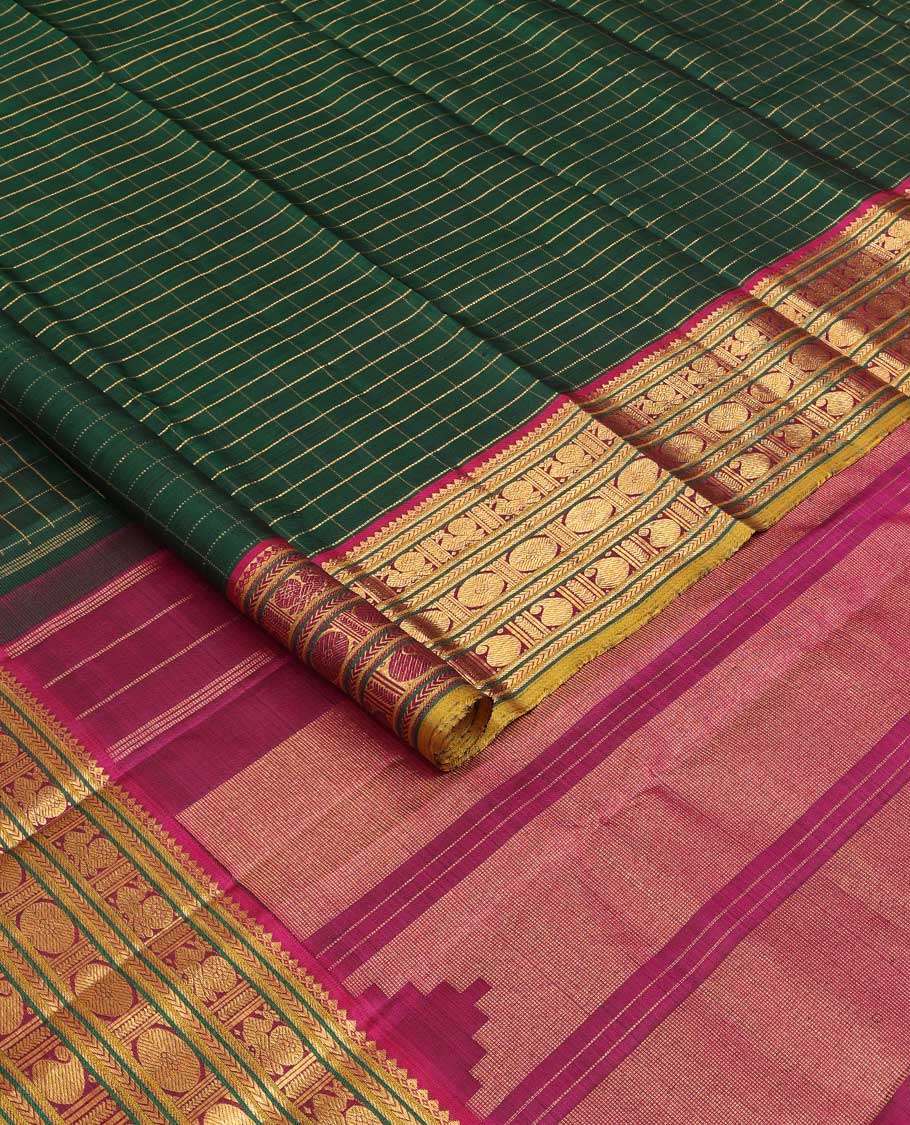 Green zari checked Kanchipuram silk saree, contrast border of thilakam mokku,kathir, and mayil chakram designs, and thazampoo rekku pallu