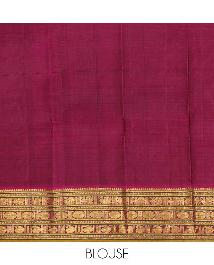 Green zari checked Kanchipuram silk saree, contrast border of thilakam mokku,kathir, and mayil chakram designs, and thazampoo rekku pallu