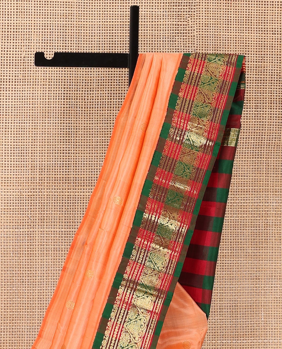 Peach zari buttas Kanchipuram silk saree, contrast one-sided korvai border of neli, and jadai nagam designs, and zari design pallu
