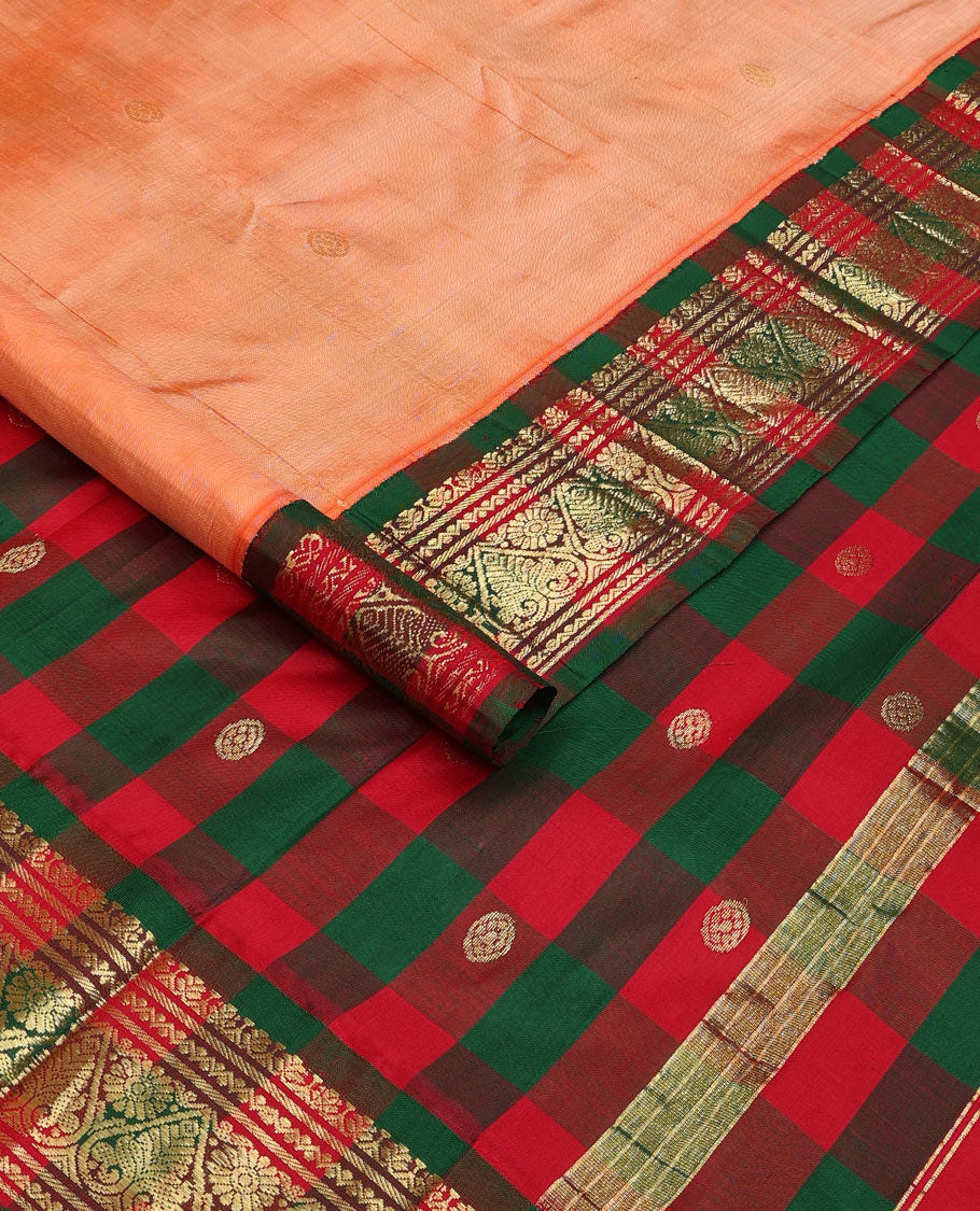Peach zari buttas Kanchipuram silk saree, contrast one-sided korvai border of neli, and jadai nagam designs, and zari design pallu