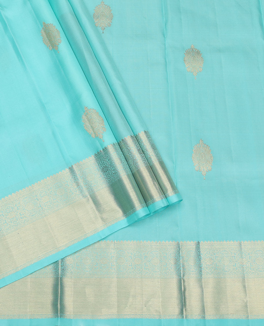 Blue Pure Silk Pavadai Material, Dazzled with Zari Buttas on Its Skirt, a Traditional Zari Border, and a Contrast Blouse