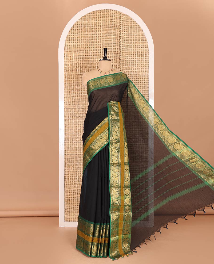 Black plain Chettinad cotton saree, contrast traditional design rettai pettu border of peacock chakram, striped pallu, and a matching blouse