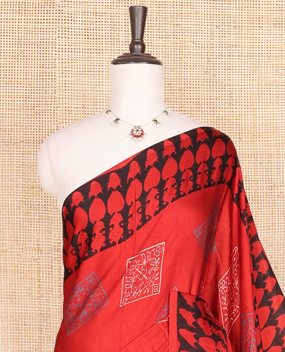 Red motifs modal saree with self intricate design border & floral design pallu