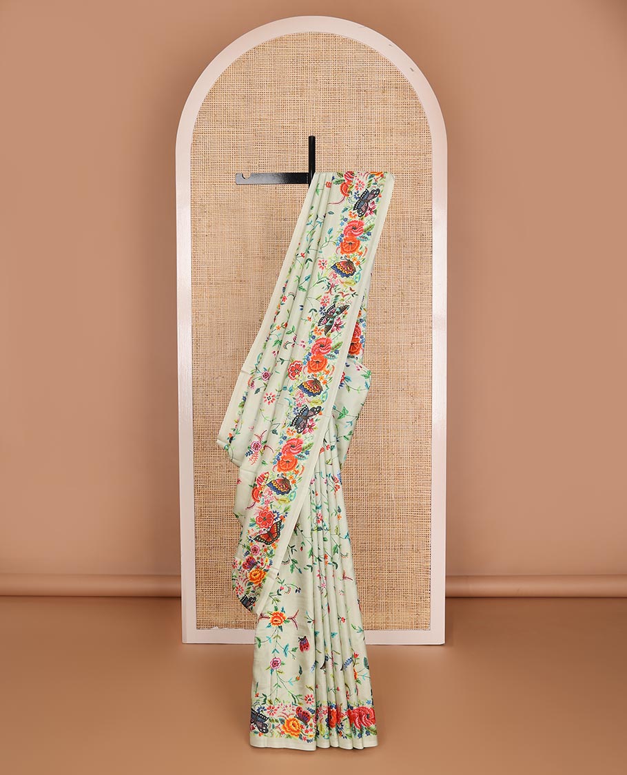 Pastel green floral vine & butterflies printed silk saree, self-border & pallu features the same floral vine & butterflies print
